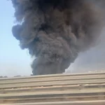 Dettaglio 6: Lequile, incendio e allarme diossina: nube di fumo visibile da Lecce e circondario